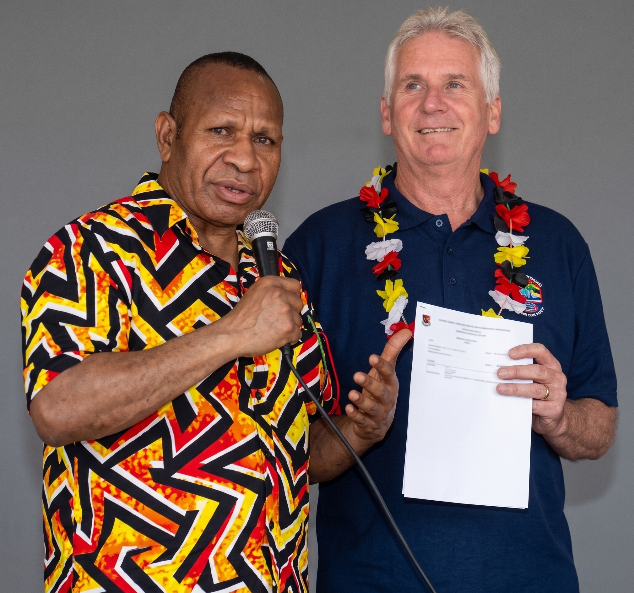 Hon. Belden Namah, MP hands the K3 million cheque to CEO Noel Wright of Vanimo Free Trade Zone Holdings Limited